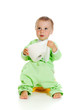 Child on potty play with toilet paper
