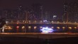 Cars quickly go on highway to Guangzhou Bridge in night