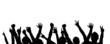 Silhouettes of dancing people in concert