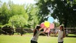 Two little girls playing with balloons; Ful HD Photo JPEG