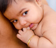 Baby lying on daddy chest