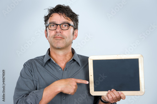 Photo: man is pointing at a tablet man is pointing at a tablet