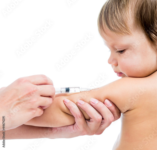 Photo: doctor vaccinating baby isplated on a white background doctor vaccinating baby isplated on a white background