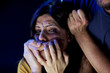 Foto: Woman with hand in front of her face not able to scream Woman with hand in front of her face not able to scream