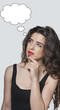 Photo: Thoughtful young woman with thought bubble looking away with hand on chin over gray background Thoughtful young woman with thought bubble looking away with hand on chin over gray background