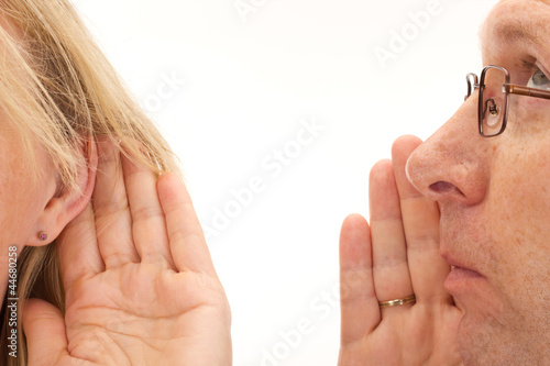 Photo: Man saying something to woman Man saying something to woman