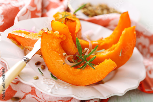 Photo: Baked pumpkin with garlic, olive oil and rosemary. Baked pumpkin with garlic, olive oil and rosemary.
