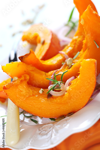 Photo: Baked pumpkin with garlic, olive oil and rosemary. Baked pumpkin with garlic, olive oil and rosemary.