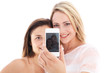 Photo: Young women showing their photograph Young women showing their photograph