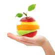 Hand holding mixed fruit