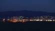 Evening view of Agios Nikolaos city across the bay, Crete