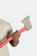 Foto: Male hand holding axe over gray background Male hand holding axe over gray background