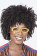 Portrait of an African American woman wearing glasses over gray background