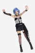 Portrait of young female punk hand gesturing over gray background