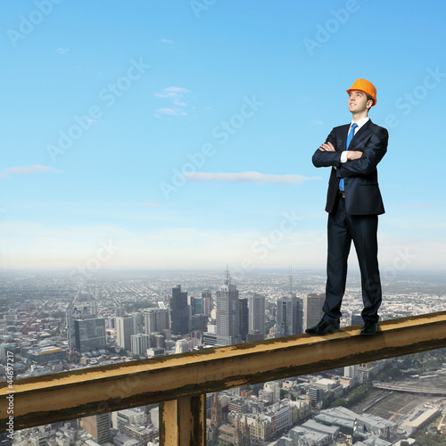 Photo: Businessman standing on the construction site Businessman standing on the construction site