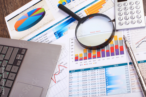 Photo: Businessman workplace with papers Businessman workplace with papers
