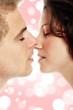 Foto: young beautiful couple kissing against glossy background young beautiful couple kissing against glossy background