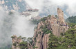 Cloudscape of  Huangshan (yellow mountain). Traveling people.