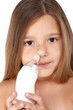 Child with nasal aspirator