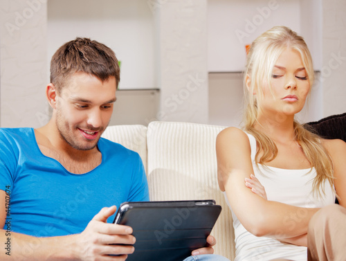 Foto: couple with tablet PC couple with tablet PC