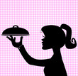 Silhouette of woman holding serving tray