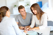 Foto: Young couple meeting financial consultant for credit loan Young couple meeting financial consultant for credit loan