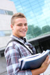 Portrait of cheerful student at college