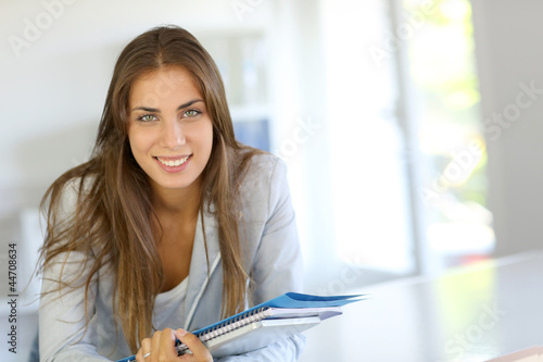 Photo: Portrait of beautiful university girl Portrait of beautiful university girl