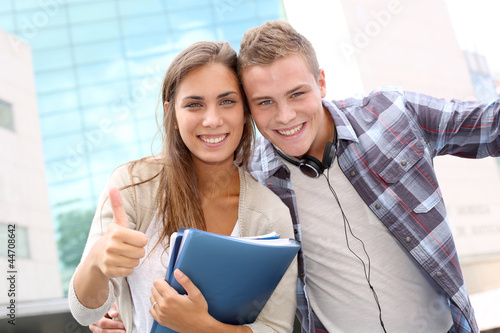 Photo: Happy students at university campus Happy students at university campus