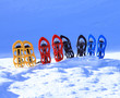 Snowshoeing. Snowshoes in the snow.