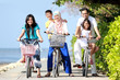 happy family with kids riding bikes