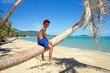 Photo: Boy on a palm tree Boy on a palm tree