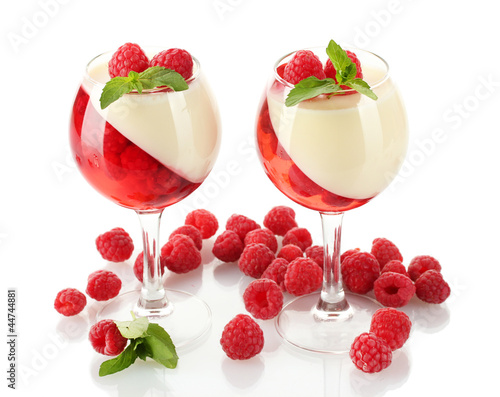 Photo: fruit jelly with raspberries in glasses isolated on white fruit jelly with raspberries in glasses isolated on white