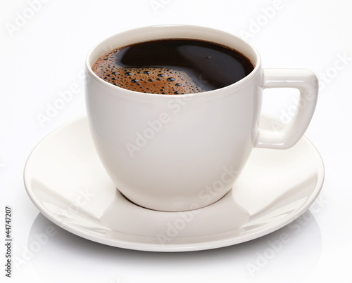 Photo: Coffee cup and saucer on a white background. Coffee cup and saucer on a white background.