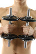 handsome model working out with dumbbells