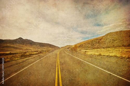 Photo: grunge image of highway and blue sky grunge image of highway and blue sky