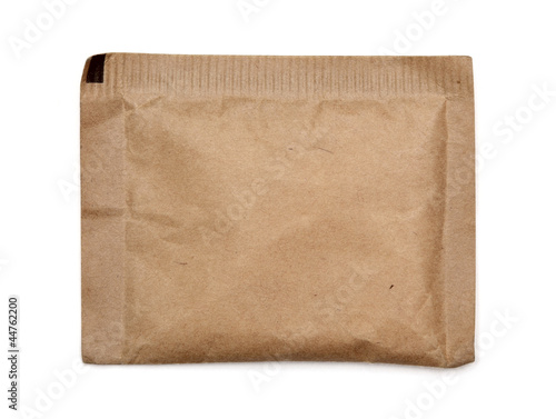 Photo: Brown paper bag on white background Brown paper bag on white background