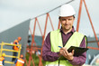 Photo: builder site manager worker at construction site builder site manager worker at construction site