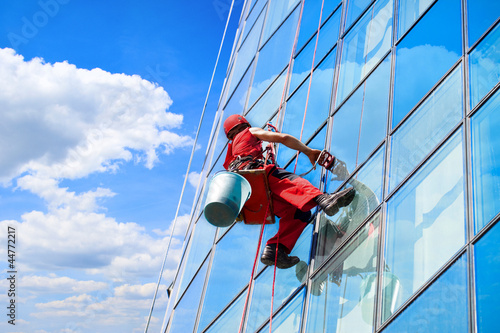 Photo: Window washer high office building Window washer high office building
