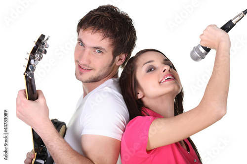 Foto: Cleancut young people in a rock band Cleancut young people in a rock band