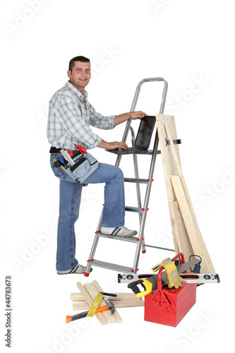 Photo: Carpenter with a laptop Carpenter with a laptop