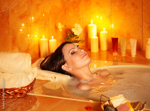Photo: Woman take bubble bath. Woman take bubble bath.