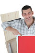 Joiner pointing to red poster board