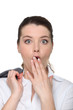 Closeup shocked woman in suit