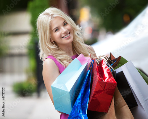 Photo: Woman with Shopping Bags Woman with Shopping Bags