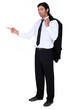 Man with a jacket over his shoulder pointing at a screen
