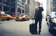 Businessman looking at his watch in New York