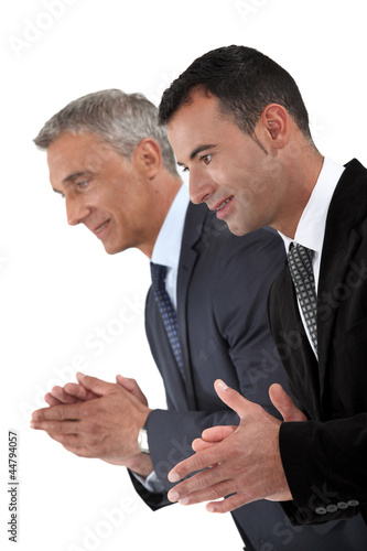 Photo: Two businessmen applauding Two businessmen applauding