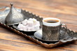 Turkish coffee and turkish delight with traditional cup and tray