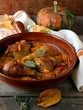 Pumpkin baked with chicken and sage